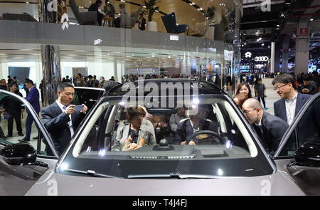 Shanghai, China. 16th Apr, 2019. Visitors view a NIO ES8 electric SUV during the 18th Shanghai International Automobile Industry Exhibition in Shanghai, east China, April 16, 2019. Credit: Fang Zhe/Xinhua/Alamy Live News
