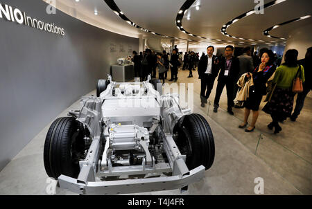 Shanghai, China. 16th Apr, 2019. Visitors view the booth of NIO during the 18th Shanghai International Automobile Industry Exhibition in Shanghai, east China, April 16, 2019. Credit: Fang Zhe/Xinhua/Alamy Live News