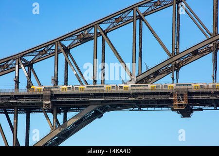 Sydney public transport train travels across the Sydney harbour bridge,Sydney,Australia Stock Photo