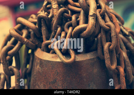 Bunch of metal chains - On a port, there are these bunch of metal chains laid up. Stock Photo