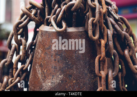 Bunch of metal chains - On a port, there are these bunch of metal chains laid up. Stock Photo