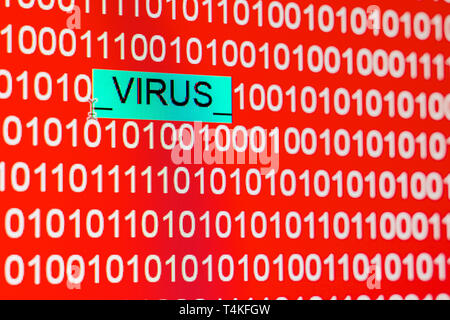 Binary code on a red background from numbers 0 and 1, virus in the system Stock Photo