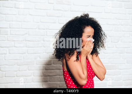 Sick Black Woman African American Girl Sneezing For Cold Allergy Stock Photo