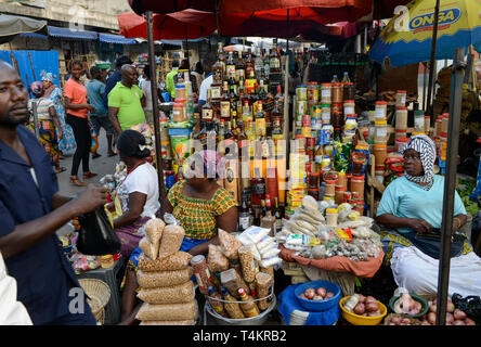 TOGO, Lome, Grande Marche, Grand market, merchant sell imported foreign liquor like John Walker Whiskey a trademark of Diageo Group UK Stock Photo