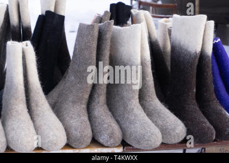 valenki - russian felt boots on white background Stock Photo