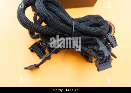 Inside of used power supply unit PSU on white background. Stock Photo