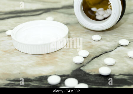 Pill bottle on red background for use in presentations, education manuals, design, etc 3D illustration Stock Photo