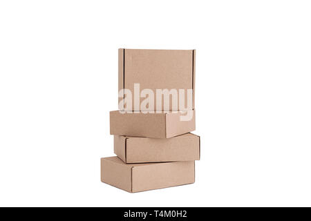 Stack of craft paper boxes isolated on white. Stock Photo