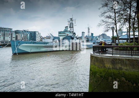 The tourist attraction HMS Belfast moored on the River Thames in London. Stock Photo