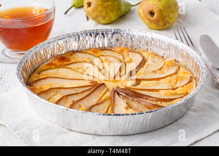 Puff pastry pies with cheese and pear in a plate Stock Photo