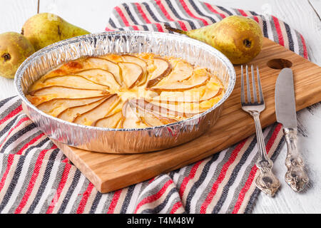 Puff pastry pies with cheese and pear in a plate Stock Photo