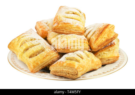 Strudel puff pastry with apple filling, sprinkled with icing sugar Stock Photo