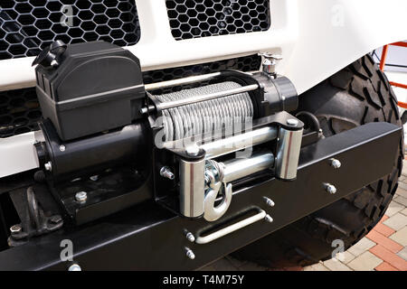 Steel wire rope winch on car Stock Photo