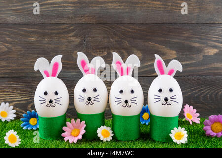 Funny easter eggs cute bunny. Creative Easter egg decoration ideas with easter bunny. Happy Easter Stock Photo