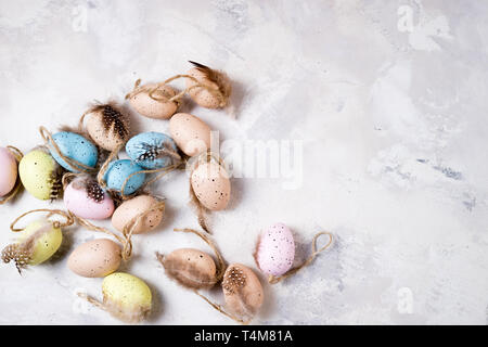 Decorative Easter eggs on stone background. Easter background. Top view, copy space Stock Photo