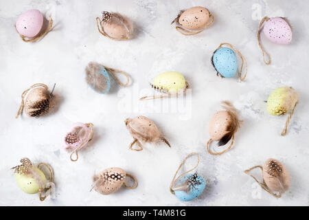 Decorative Easter eggs on stone background. Easter background. Pattern of Easter eggs top view Stock Photo