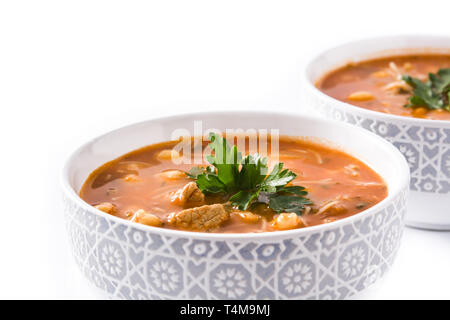 Harira soup in bowl isolated on white background. Typical Moroccan food. Ramadán concept. Stock Photo