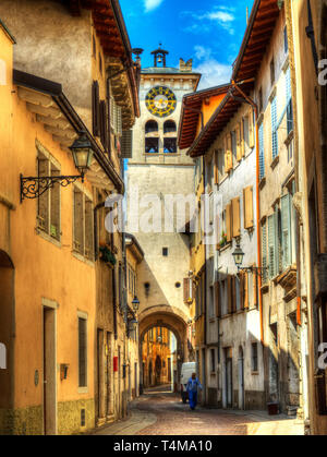Rovereto, the Civic Tower also known as the Clock. The Tower seen from the ancient Via della Terra, erected in 1500 above the first city walls, Stock Photo
