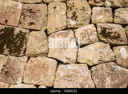 Ancient japanese stone wall made of rocks as background Stock Photo - Alamy