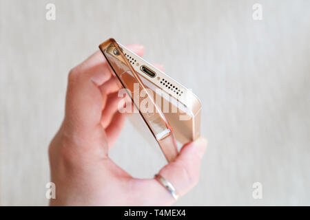 Silicone case for smartphone bent in his hand Stock Photo