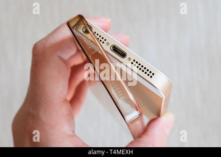 Silicone case for smartphone bent in his hand Stock Photo