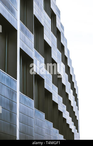 Closeup of modern building facade with repeatable rectangles in grey Stock Photo