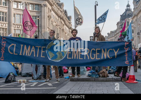 London, UK - April 15, 2019: Extinction Rebellion campaigners barricade at Oxford Circus, The campaigners blocked Oxford Circus, Marble Arch, Piccadil Stock Photo