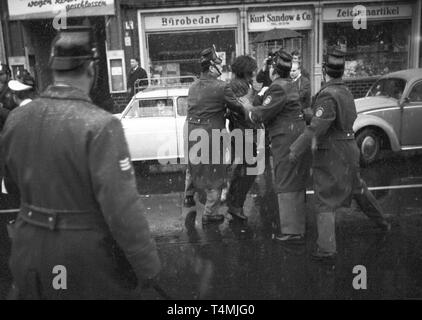 The police uses water guns against demonstrators, who demand Fritz Teufel's release on 27 November 1967. | usage worldwide Stock Photo