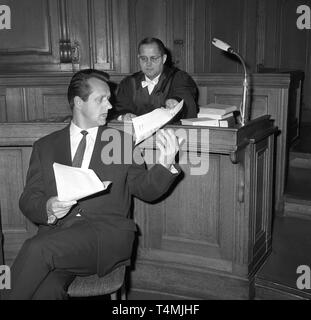 Police inspector Karl-Heinz Kurras' lawyer Gerd-Joachim Roos (l) and ...