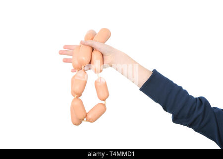 Sausages in a girl hand on a white background isolation Stock Photo