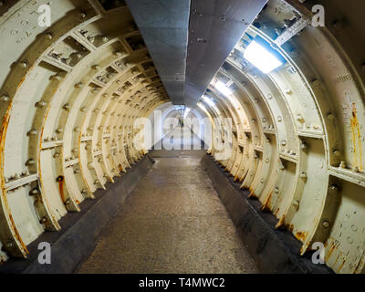 The Greenwich Foot Tunnel crosses beneath the River Thames in East London, linking Greenwich (Royal Borough of Greenwich) on the south bank with the Isle of Dogs (London Borough of Tower Hamlets) on the north Stock Photo