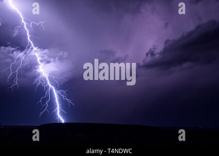 Lightning bolt strike in a thunder storm over Tucson, Arizona Stock Photo
