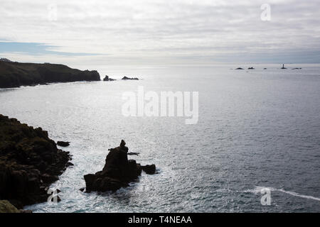 Looking towards Lands End and the longships lighthouse from Sennen, Cornwall, UK. Stock Photo