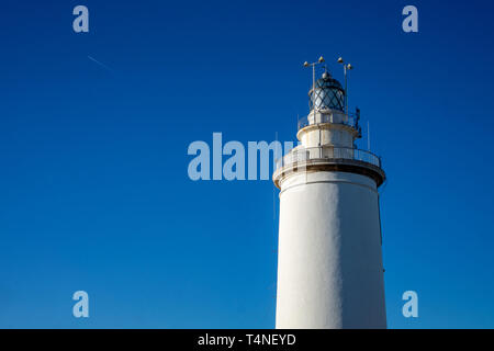 Lighthouse La Farola de Malaga in Malaga city. Andalusia, Costa del sol, Spain Stock Photo