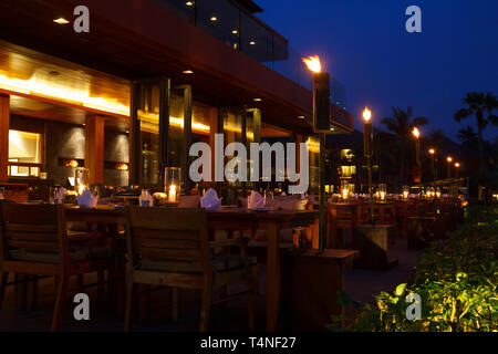 Restaurant tables outdoor table setting at evening Stock Photo