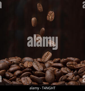 Coffee beans falling down Stock Photo