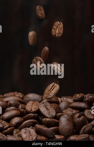 Coffee beans falling down Stock Photo