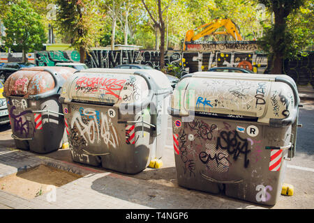 16 JULY 2018, TARRAGONA, SPAIN: A group of Garbage cans on the side of the road. Stock Photo