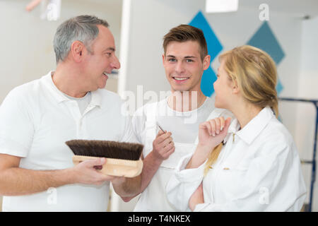 professional interior renovation crew at work in house Stock Photo