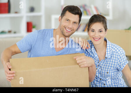 happy couple happy to enter their new home Stock Photo