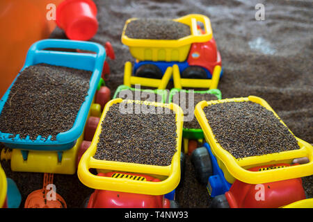 Kid colourful toys with man made safe sand from cassia tora seed Stock Photo