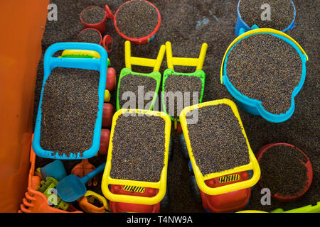 Kid colourful toys with man made safe sand from cassia tora seed Stock Photo