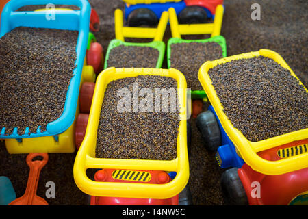 Kid colourful toys with man made safe sand from cassia tora seed Stock Photo