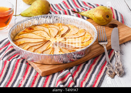 Puff pastry pies with cheese and pear in a plate Stock Photo