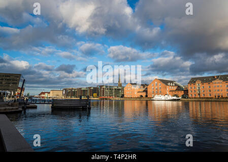 Old waterfront buildings along Copenhagen Harbour in the city centre, Christianshavn, Copenhagen, Denmark Stock Photo