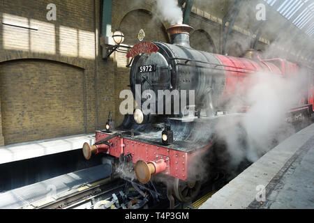 The Hogwarts Express Train at Universal Studios is a theme park ride that takes guest between Diagon Alley and Hogsmeade. Stock Photo