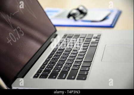 man Hands typing on computer laptop desktop with female hands working on modern laptop Stock Photo