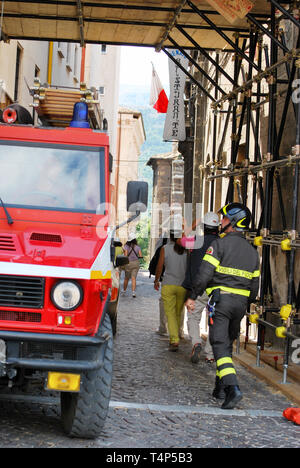 Firefighters plan to put in safety buildings damaged after the earthquake - L'aquila, Italy. © Antonio Ciufo Stock Photo