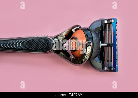 LONDON - APRIL 14, 2019: Gillette razor blade on pink background Stock Photo