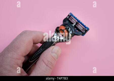 LONDON - APRIL 14, 2019: Gillette razor blade on pink background Stock Photo